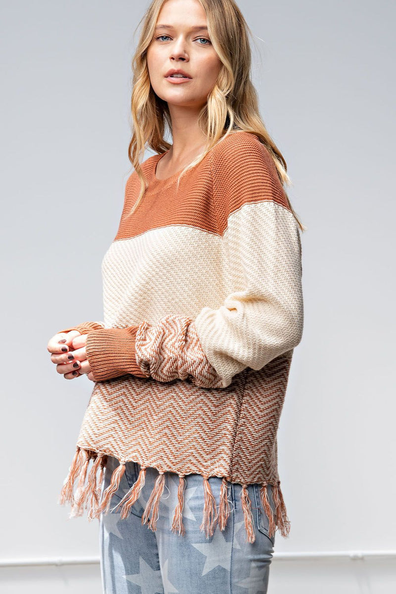 Sweater with clearance fringe on bottom